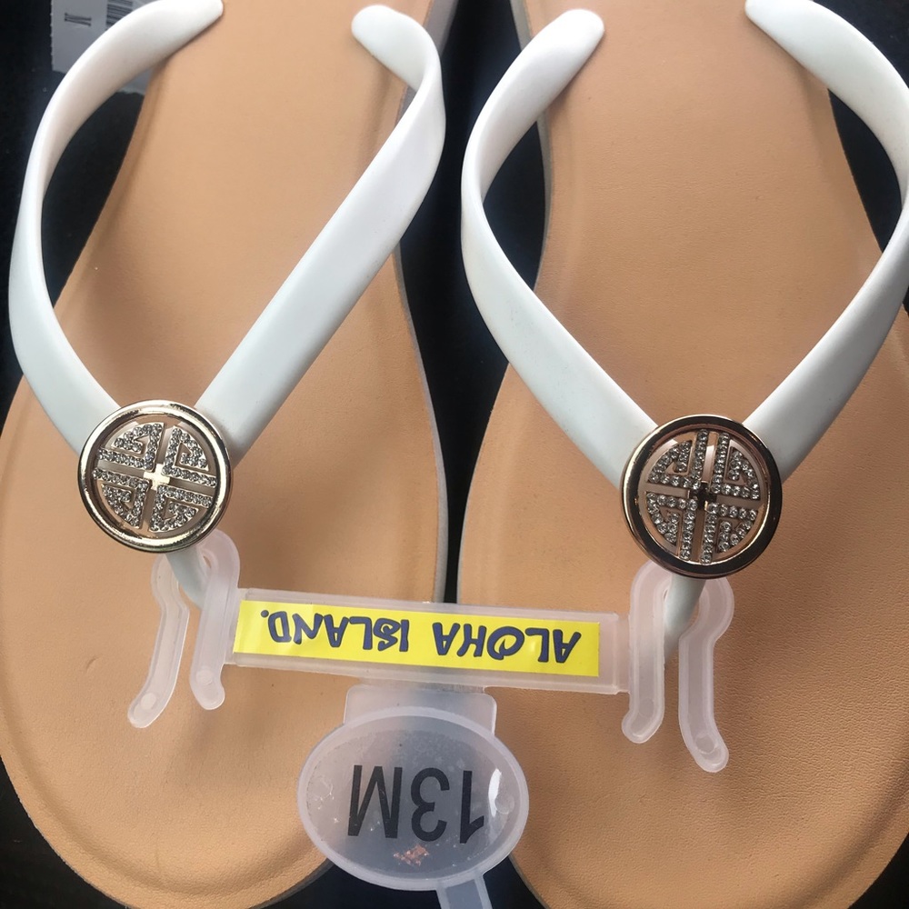 S O L D ....$White size 13 Aloha Island sandals.